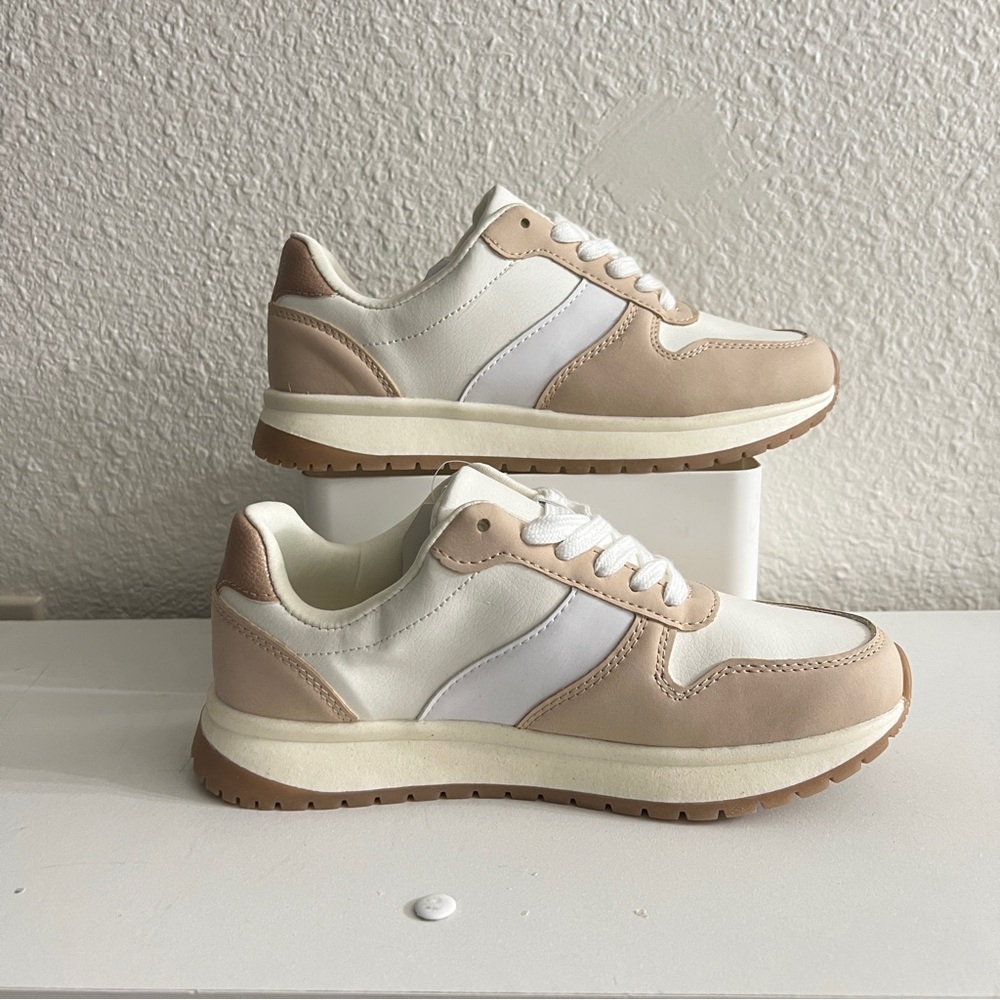 Cream and tan sneakers. Super cute.
